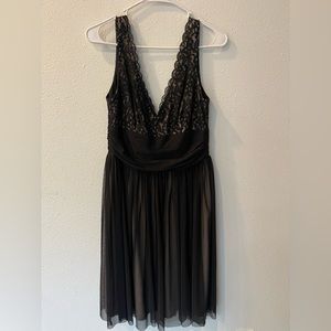 Black and tan dress with black lace a cocktail dress